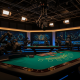 A wide, cinematic view of a luxurious and high-tech live casino studio featuring an empty blackjack table, multiple HD cameras, and glowing control panels, conveying a professional and secure online gaming environment.